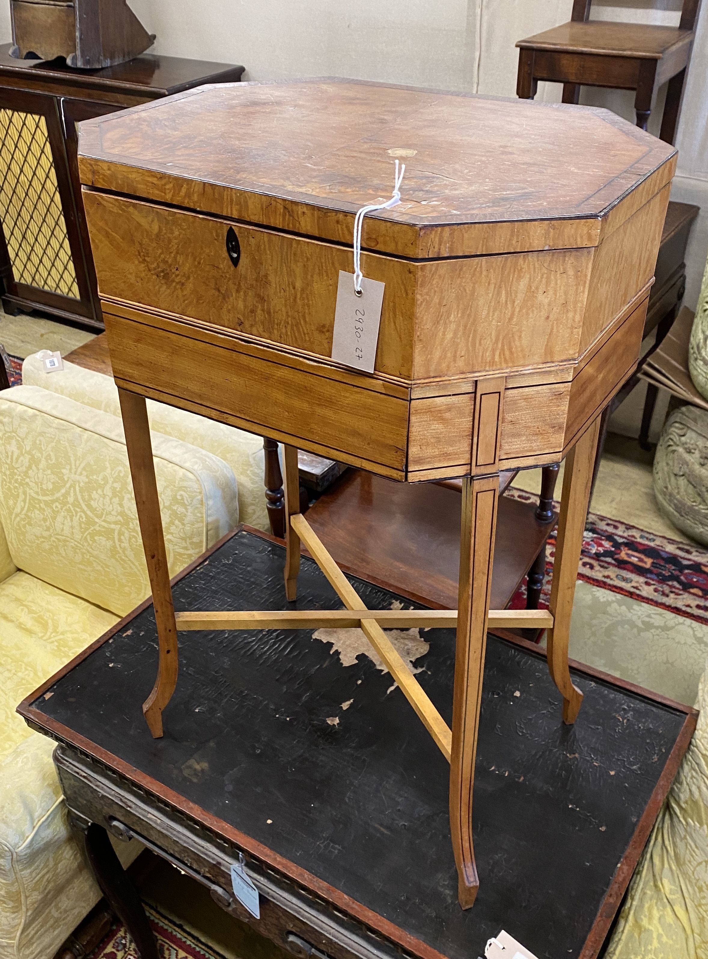 A Georgian design banded satinwood octagonal sewing table, width 49cm, depth 36cm, height 77cm